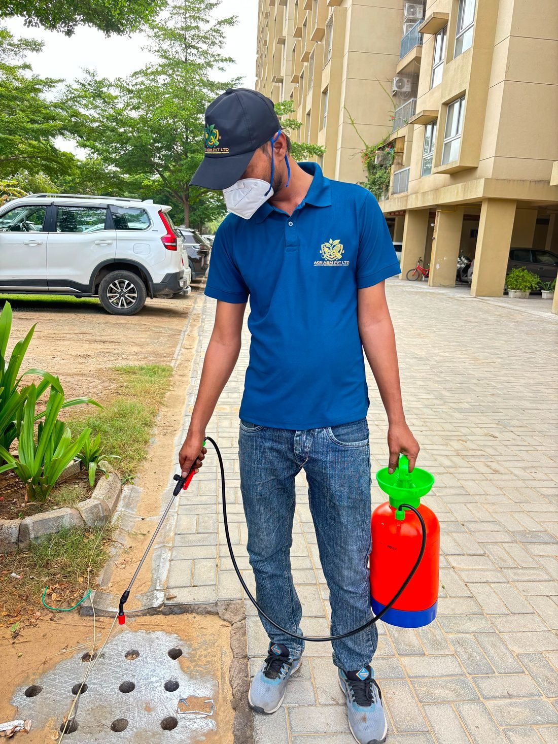 Agri ABM Pvt Ltd technician performing pest control treatment at a residential society in Rajasthan